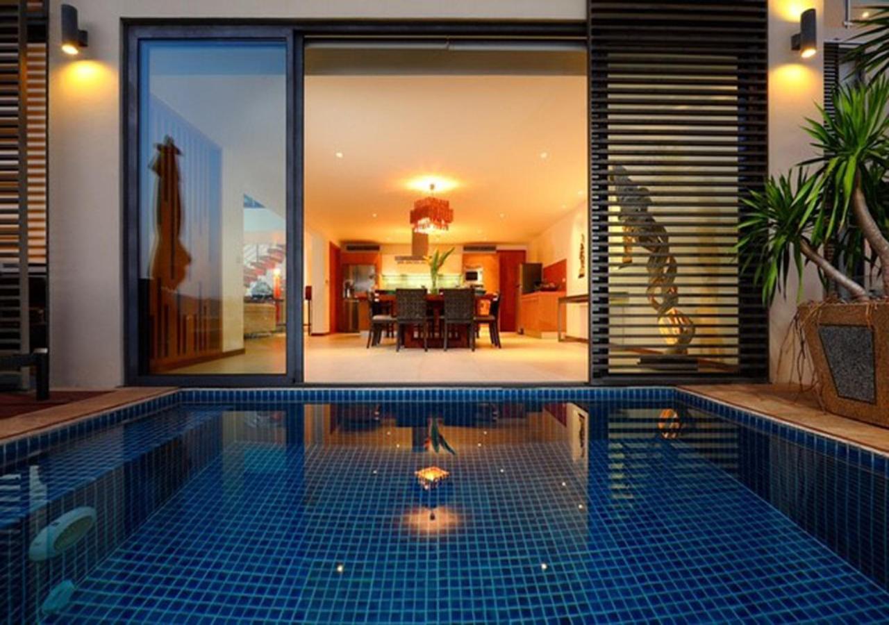 Indochine Resort And Villas - Sha Extra Plus Patong Dış mekan fotoğraf A pool at the hotel