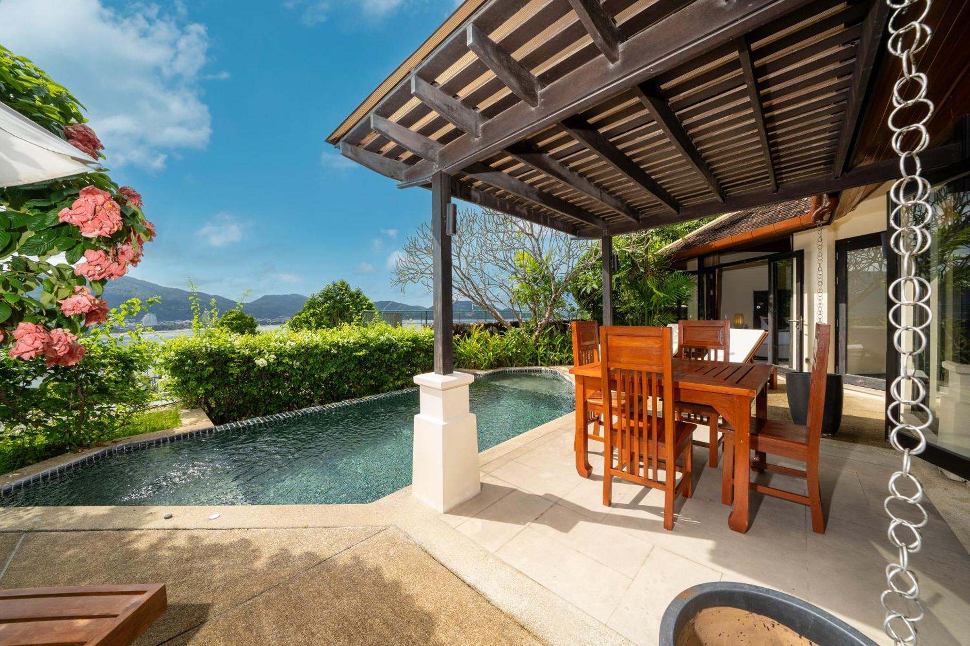 Indochine Resort And Villas - Sha Extra Plus Patong Dış mekan fotoğraf A poolside pergola